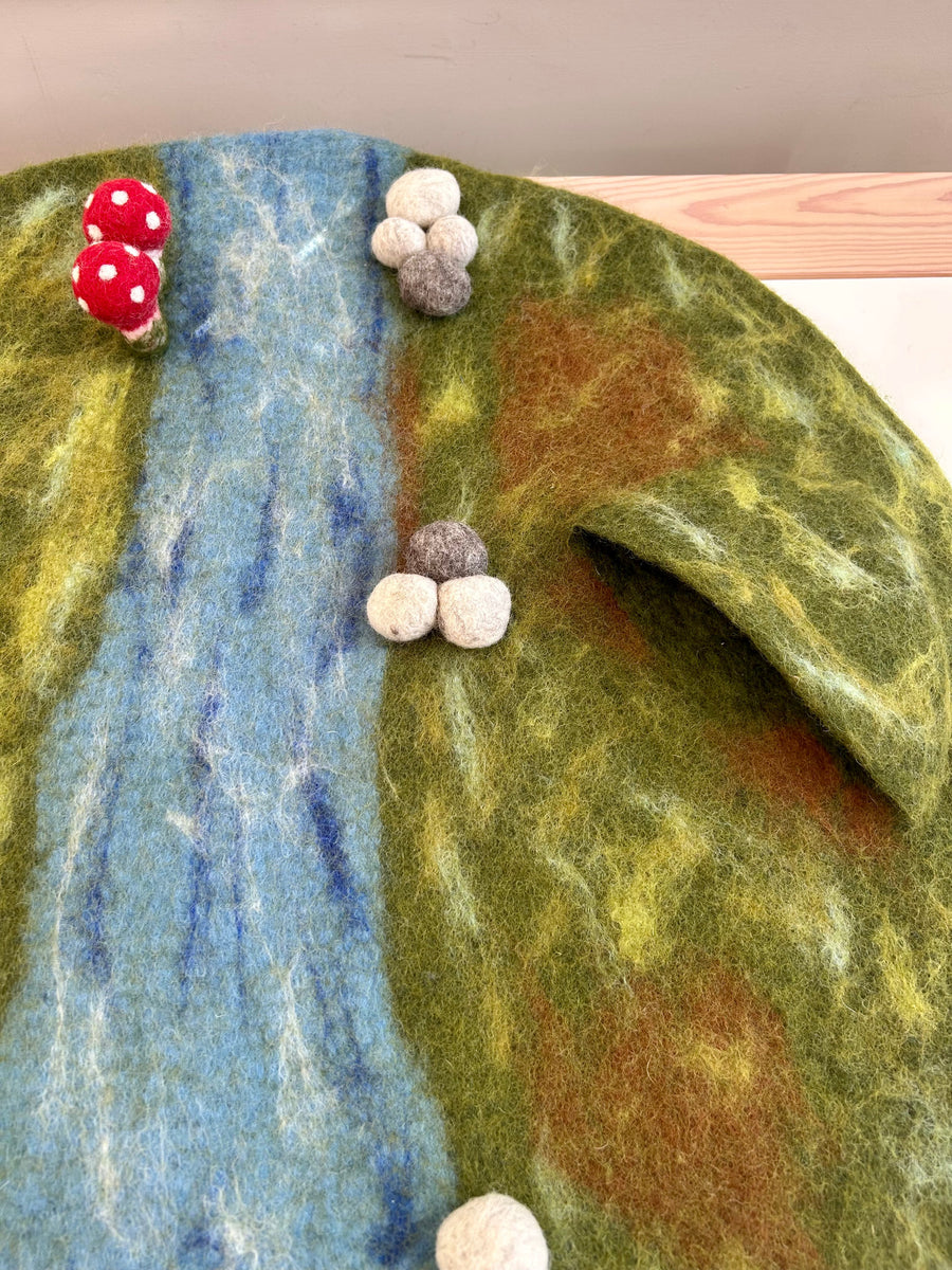 Whimsical felt play mat, detail view
