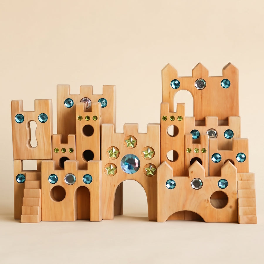 Bauspiel Large Fairytale Castle, all 16 pieces arranged as a tall castle with staircases, keyhole walls and gem-set towers