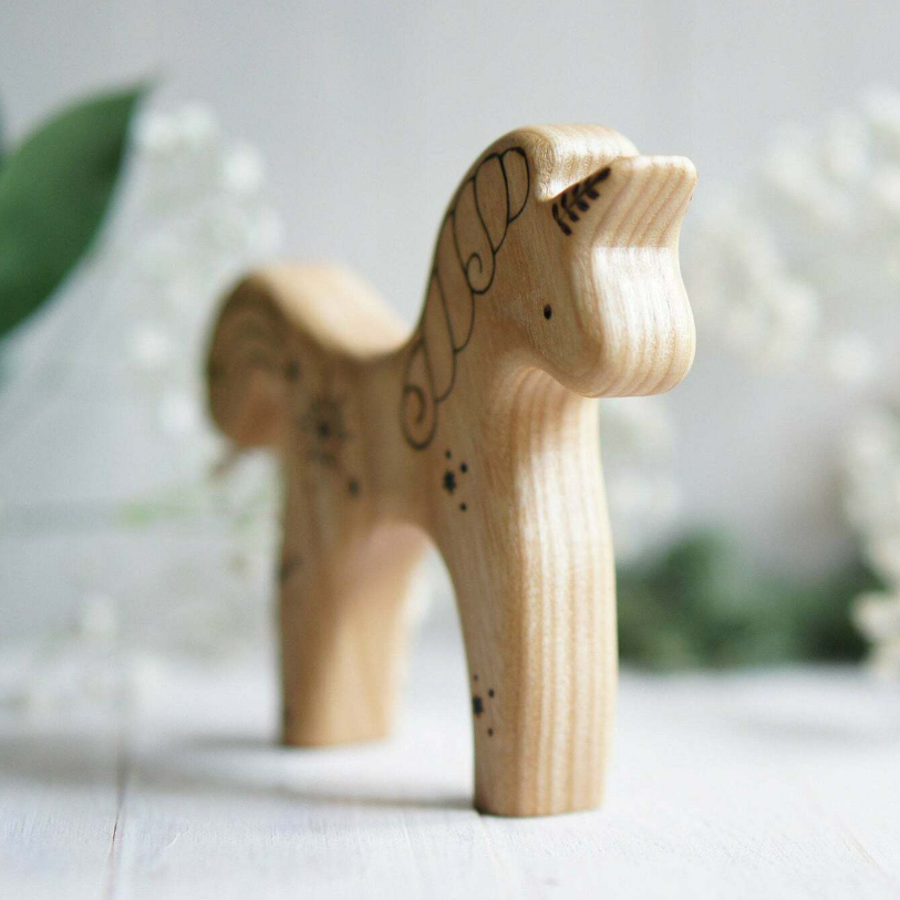 Wooden Unicorn Toy, Star, a hand-carved wooden toy by Tiny Fox Hole.