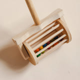 Q Toys Mower Push Toy, wooden push mower with colored balls that tumble inside the drum · view 1
