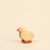 Mako Toys wooden gosling, a small pale goose chick standing on an orange base · view 1