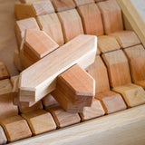 Close-up of interlocking Bauspiel X-Blocks in natural alder · view 4