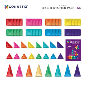 A child topping a Bright magnetic tile tower with triangles