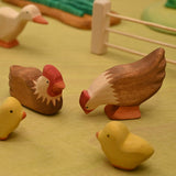 Wooden pecking hen shown in profile, carved from linden wood · view 2
