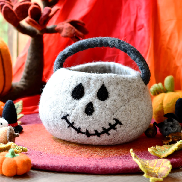 Gray felt trick-or-treat bag shaped as a skull, with a carrying handle