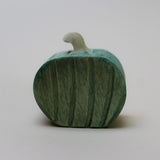 Juharka wooden green pumpkin with carved ribs and a pale stem, hand-painted in maple · view 1