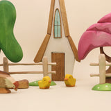 Second view of the wooden house showing the removable door · view 2