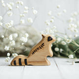 Wooden Baby Raccoon, Sitting · view 1