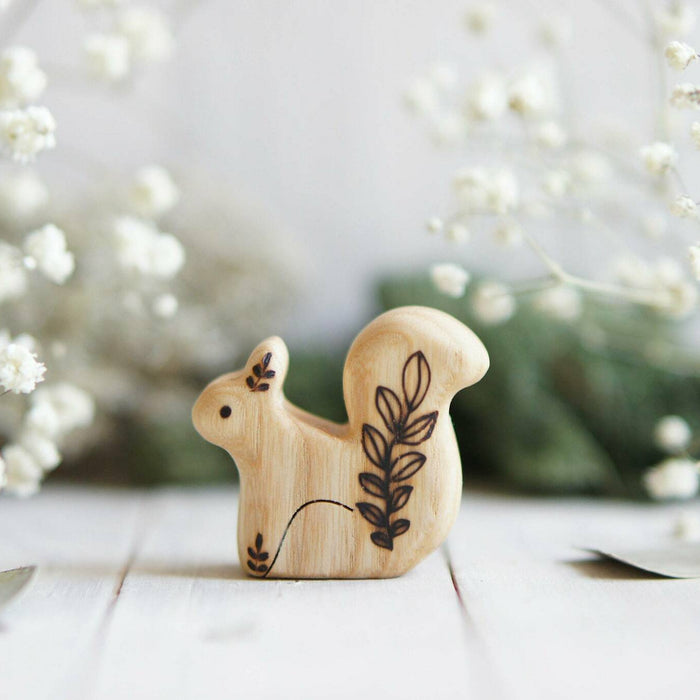 Wooden Baby Squirrel, Sitting, a natural wood animal toy by Tiny Fox Hole, cut and finished by hand from solid wood