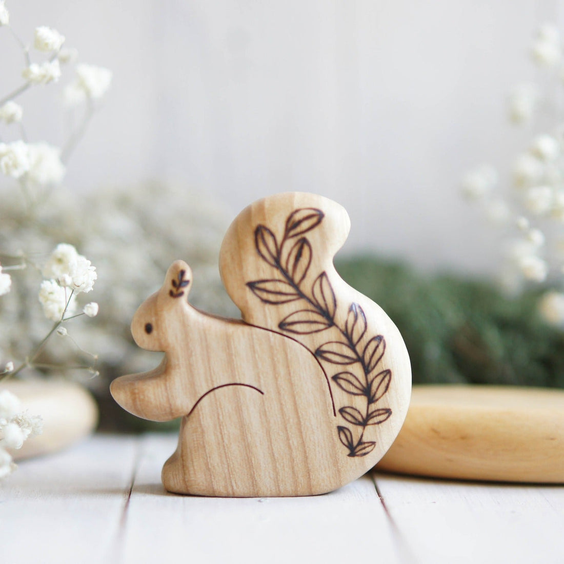 Wooden Squirrel with Leaves