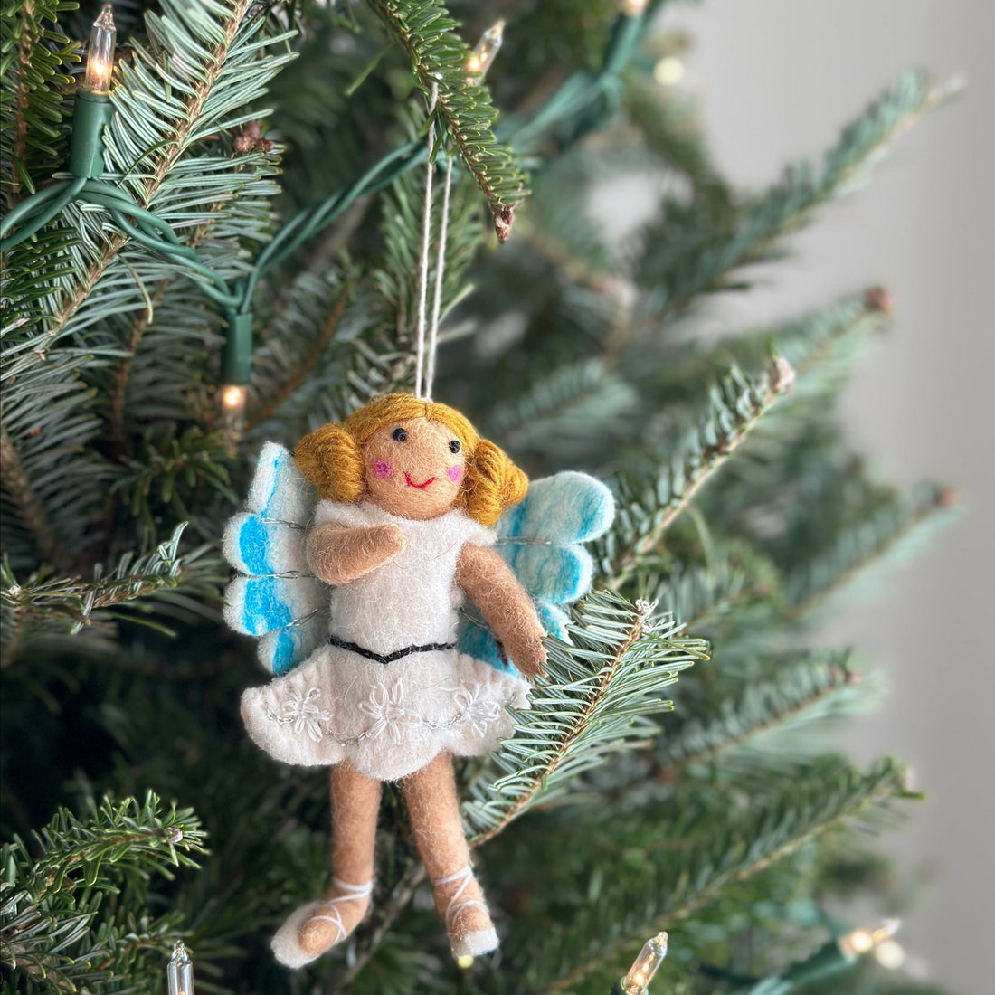 Felt Fairy Girl Ornament, a wool felt ornament by Ganapati Crafts Co., needle-felted and hand-stitched in Nepal