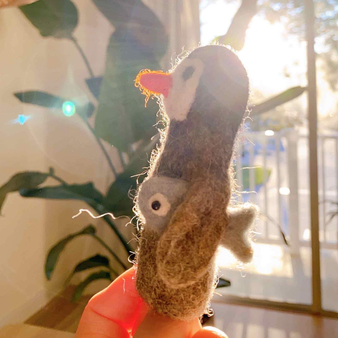 Felt Penguin Carrying A Fish Finger Puppet