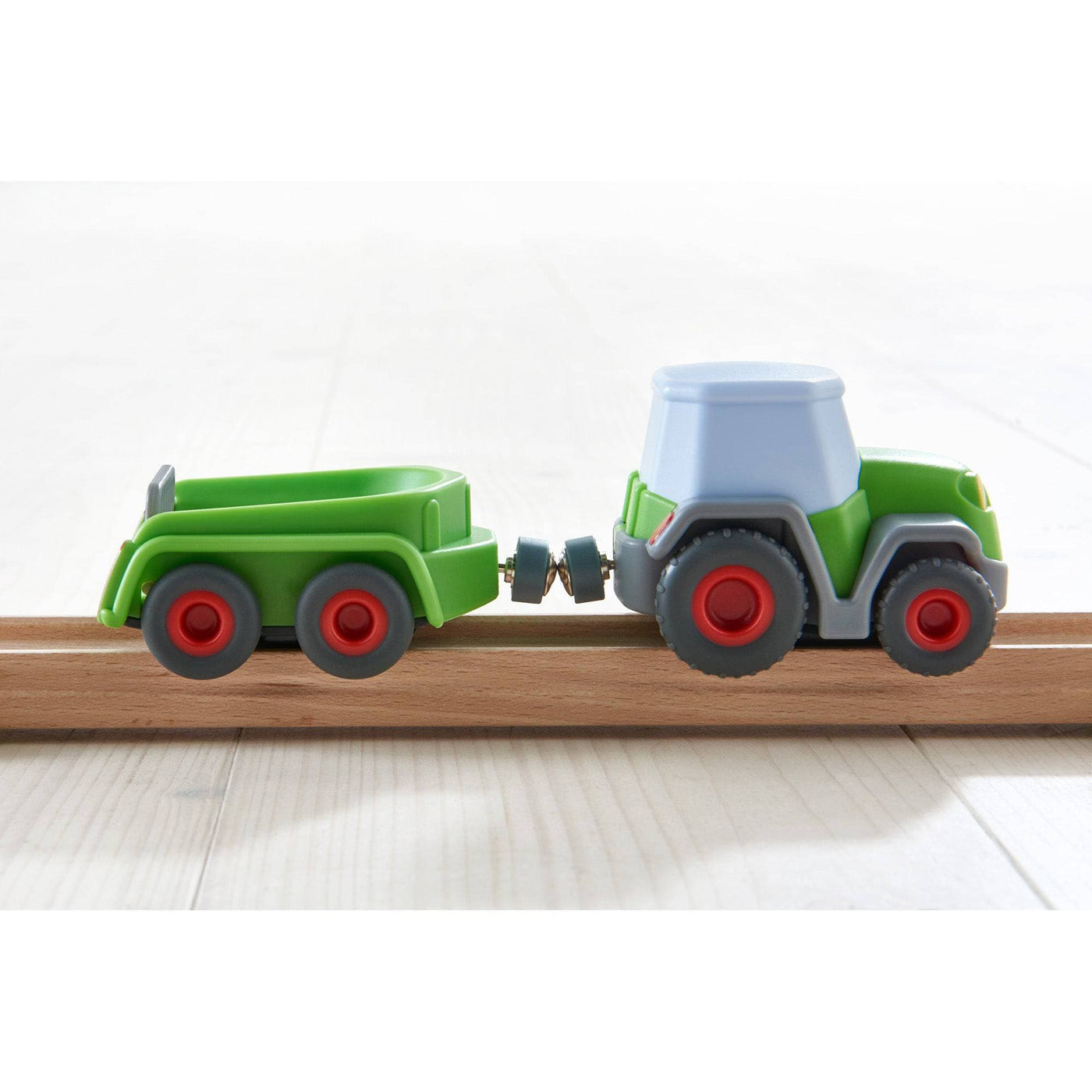 HABA Kullerbu Tractor and Trailer with Momentum Motor