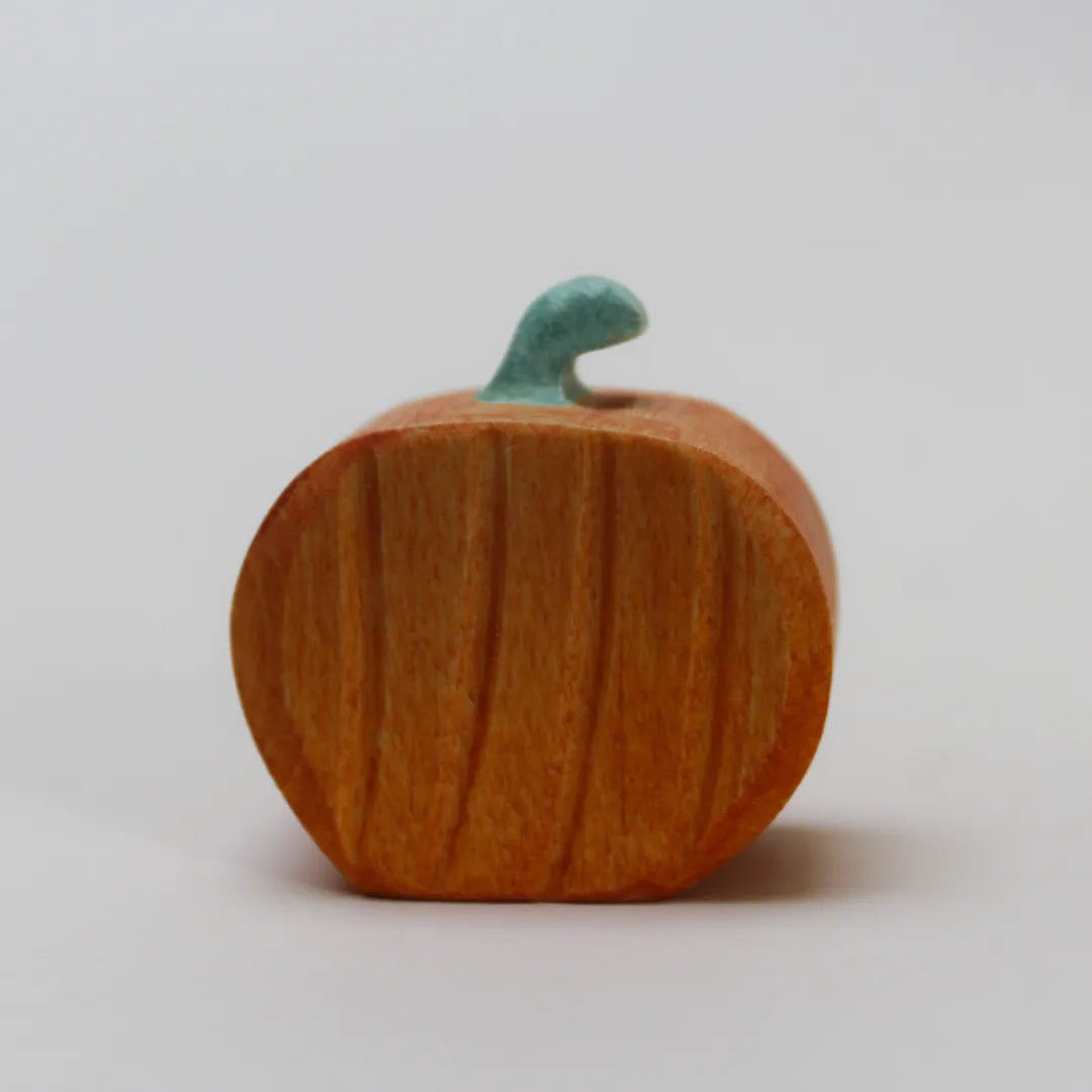 Juharka wooden orange pumpkin with carved ribs and a curled green stem