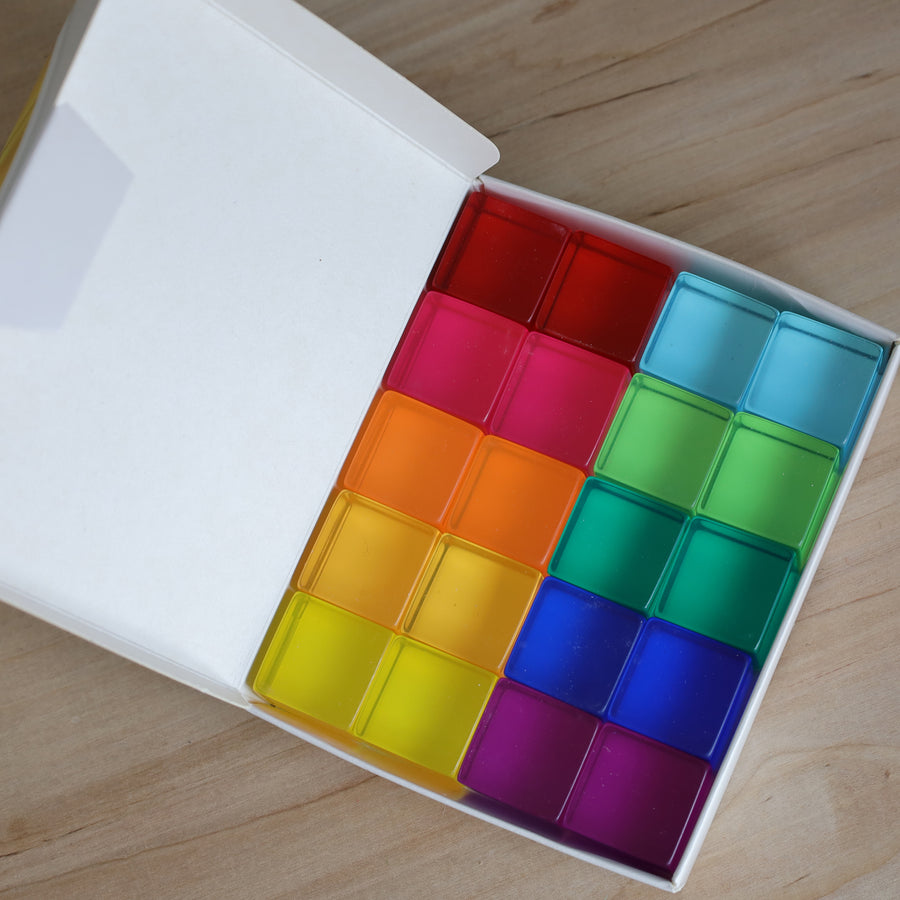 Bauspiel Lucent Cubes, Set of 20, in the open box sorted by color
